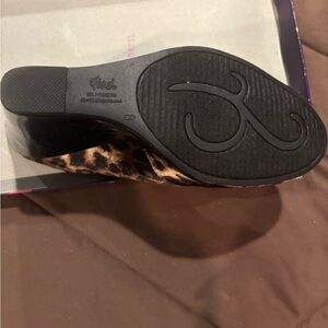 Brown and black wedge shoe